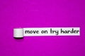 Move on try harder text, Inspiration, Motivation and business concept on purple torn paper