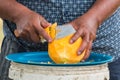 moveing a knife to chop papaya