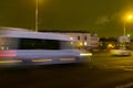 The movement of a blurred white minibus along the overpass Royalty Free Stock Photo
