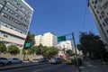 Movement on Boulevard 28 de Setembro with its buildings on a blue sky day in the city