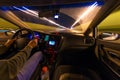 Movement of the car at night at a speed view from the interior, Brilliant road with lights with a car at high speed Royalty Free Stock Photo