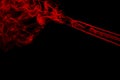 Movement of colorful smoke. Abstract red smoke on black background. Royalty Free Stock Photo