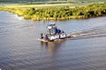 The movement of sea merchant ships and tugs to the entrance and exit from the port. Beaumont, Texas Royalty Free Stock Photo