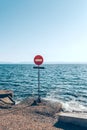 The movement of vehicles is prohibited. Road sign at the exit from the road to the seashore. Stop