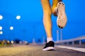 Movement. Woman legs running on road