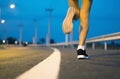 Movement. Woman legs running on road