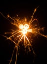 Movie camera icon in glowing sparks Royalty Free Stock Photo