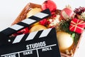 Movie clapper board and christmas decoration Royalty Free Stock Photo