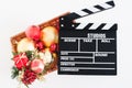 Movie clapper board and christmas decoration Royalty Free Stock Photo