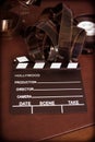 Movie clapper board and filmstrip selective focus Royalty Free Stock Photo