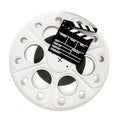 Movie clapper on 35 mm cinema film reel isolated Royalty Free Stock Photo