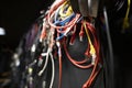 Lots of different audio and internet cables in a dark studio room Royalty Free Stock Photo