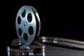 Movie film reel on dark Royalty Free Stock Photo