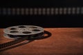 Movie film reel on dark Royalty Free Stock Photo