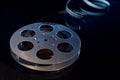 Movie film reel on dark Royalty Free Stock Photo