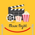 Movie night. Red rope barrier stanchions turnstile facecontrol Open clapper board reel Popcorn box Ticket Admit one. Three star. C Royalty Free Stock Photo