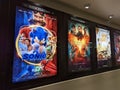 Movie posters outside of movie theater