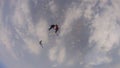 Movie. Professional parachutists perform tricks in the air. Aerial acrobatics.