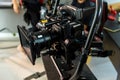 Movie shooting or video production and film crew team with camera equipment. Video camera operator working with equipment. Directo