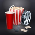 Movie showing with Popcorn, film reel and drinks