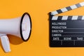 Movie slateboard clapper with megaphone Royalty Free Stock Photo