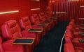 Movie theater empty auditorium with red leather comfortable chair Royalty Free Stock Photo