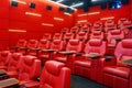 Movie theater empty auditorium with red leather comfortable chair