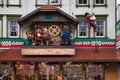 Moving bear figurines on the front of a clock store Royalty Free Stock Photo