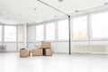 moving boxes in a empty office, removal and relocation Royalty Free Stock Photo