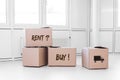 moving boxes in a empty room, Rent and buy words in english Royalty Free Stock Photo