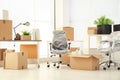 Moving boxes and furniture Royalty Free Stock Photo