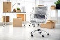 Moving boxes and furniture Royalty Free Stock Photo