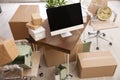 Moving boxes and furniture in office Royalty Free Stock Photo