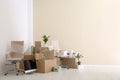 Moving boxes and furniture in new office Royalty Free Stock Photo