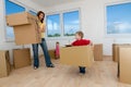 Moving boxes and new home Royalty Free Stock Photo