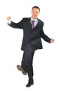 Moving businessman in black suit Royalty Free Stock Photo