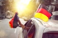 Car with blowing German flags Royalty Free Stock Photo