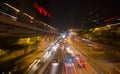 Moving cars with fast blurred trail of headlights Royalty Free Stock Photo