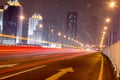Moving cars with fast blurred trail of headlights Royalty Free Stock Photo
