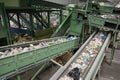 Moving conveyor transporter on Modern waste recycling processing plant. Separate and sorting garbage collection. Royalty Free Stock Photo