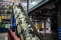 Moving conveyor transporter on Modern waste recycling processing plant. Separate and sorting garbage collection. Recycling and Royalty Free Stock Photo