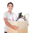 Moving day. man with cardboard box Royalty Free Stock Photo