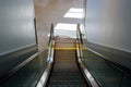 Moving escalator in the automatic stairs international airport Royalty Free Stock Photo
