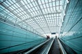 Moving escalator in modern airport hall Royalty Free Stock Photo