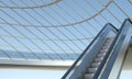 Moving escalator and modern office building Royalty Free Stock Photo