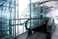 Moving escalator in the office hall Royalty Free Stock Photo