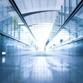 Moving escalator in the office hall Royalty Free Stock Photo