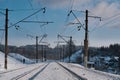 A moving figure near the railroad. Winter railway landscape.