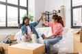 happy women moving to new home and counting money Royalty Free Stock Photo