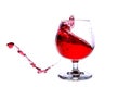 moving a glass of red wine on a white background Royalty Free Stock Photo